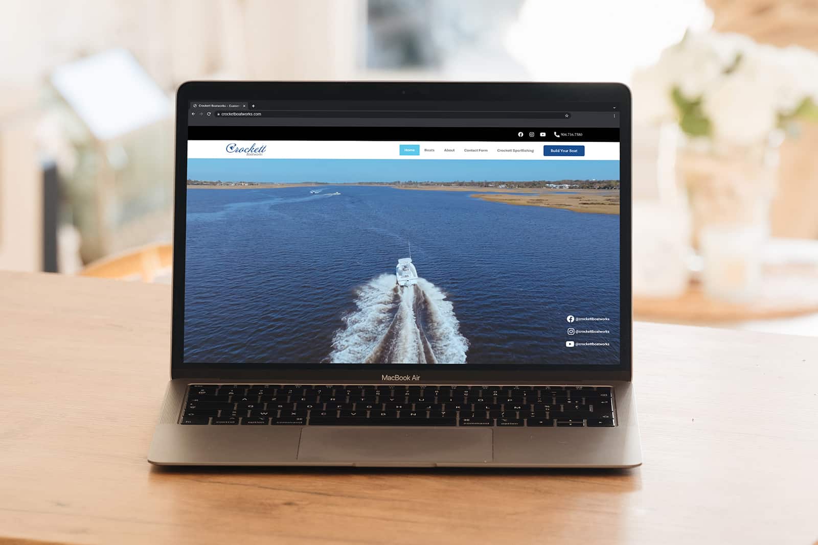 picture of laptop with crockett boatworks website design